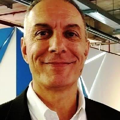 Retrato profissional de João Cancio, diretor da XYZ Consultoria e especialista em transformação cultural e gestão.